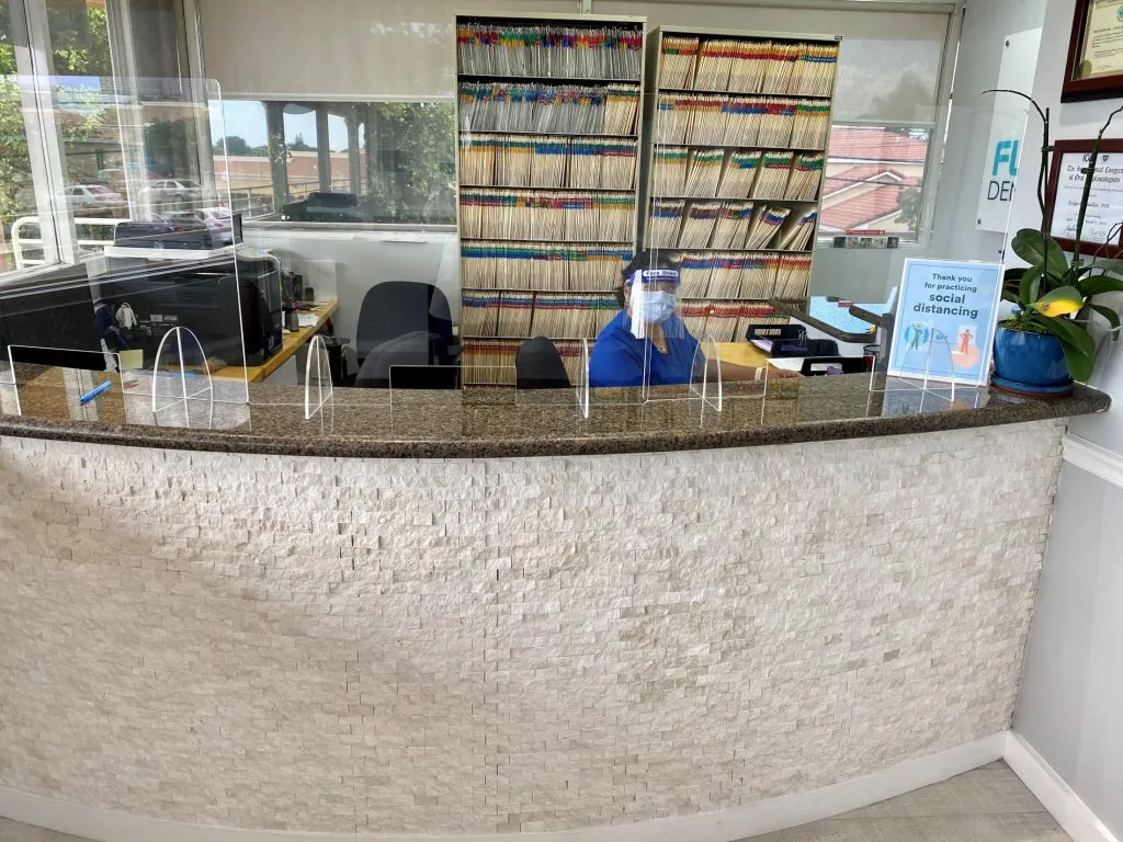 Front Office with Glass Shield Flagler Dental Clinic of Miami