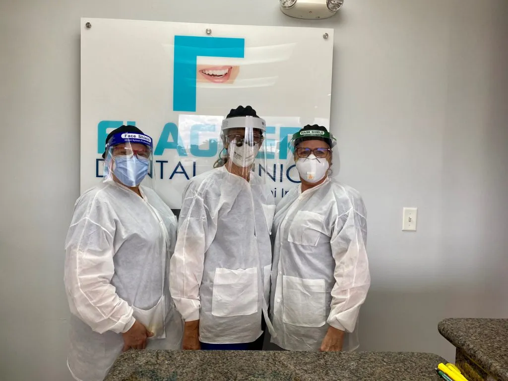 Staff wearing PPE 2 Flagler Dental Clinic of Miami